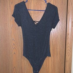 Charlotte Russe Body suit. Good condition. Size Medium